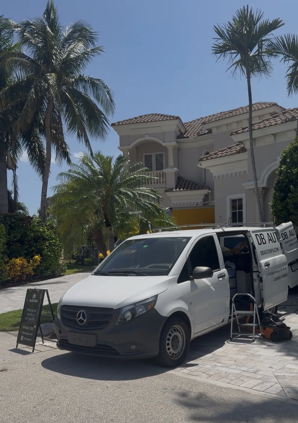 DB Auto Spa Mercedes-Benz mobile detailing van parked at a South Florida home
